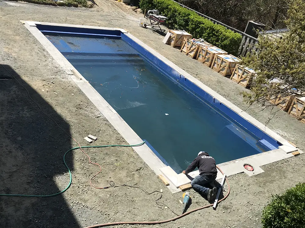 Evo Pools's guide to integrating fiberglass pool installations during a new home build